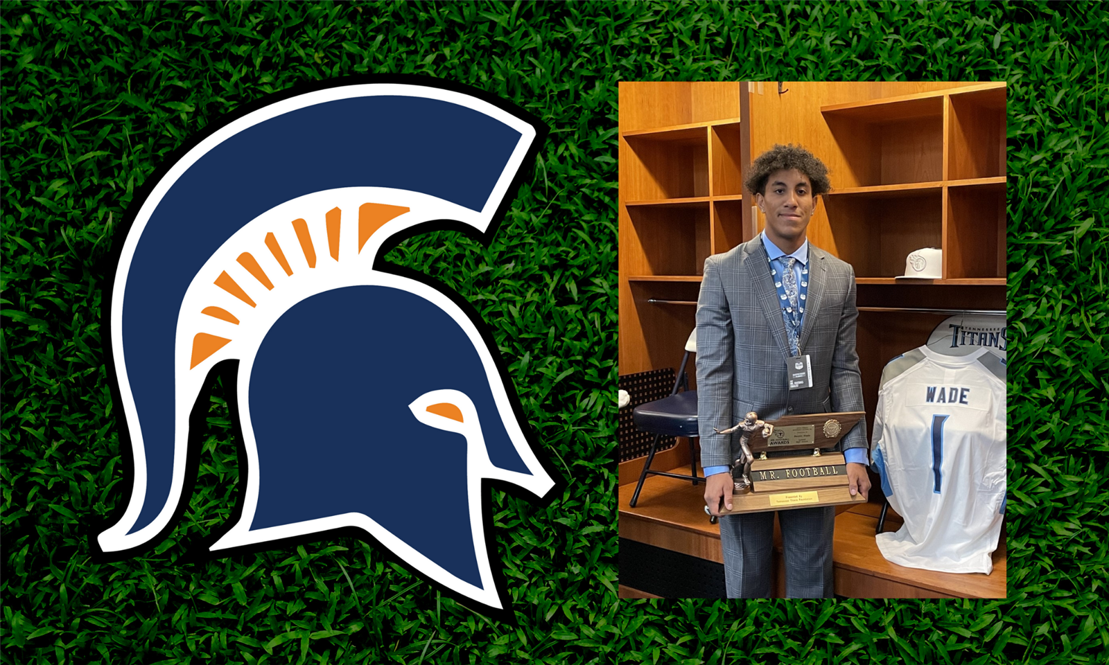 Destin Wade holds an award